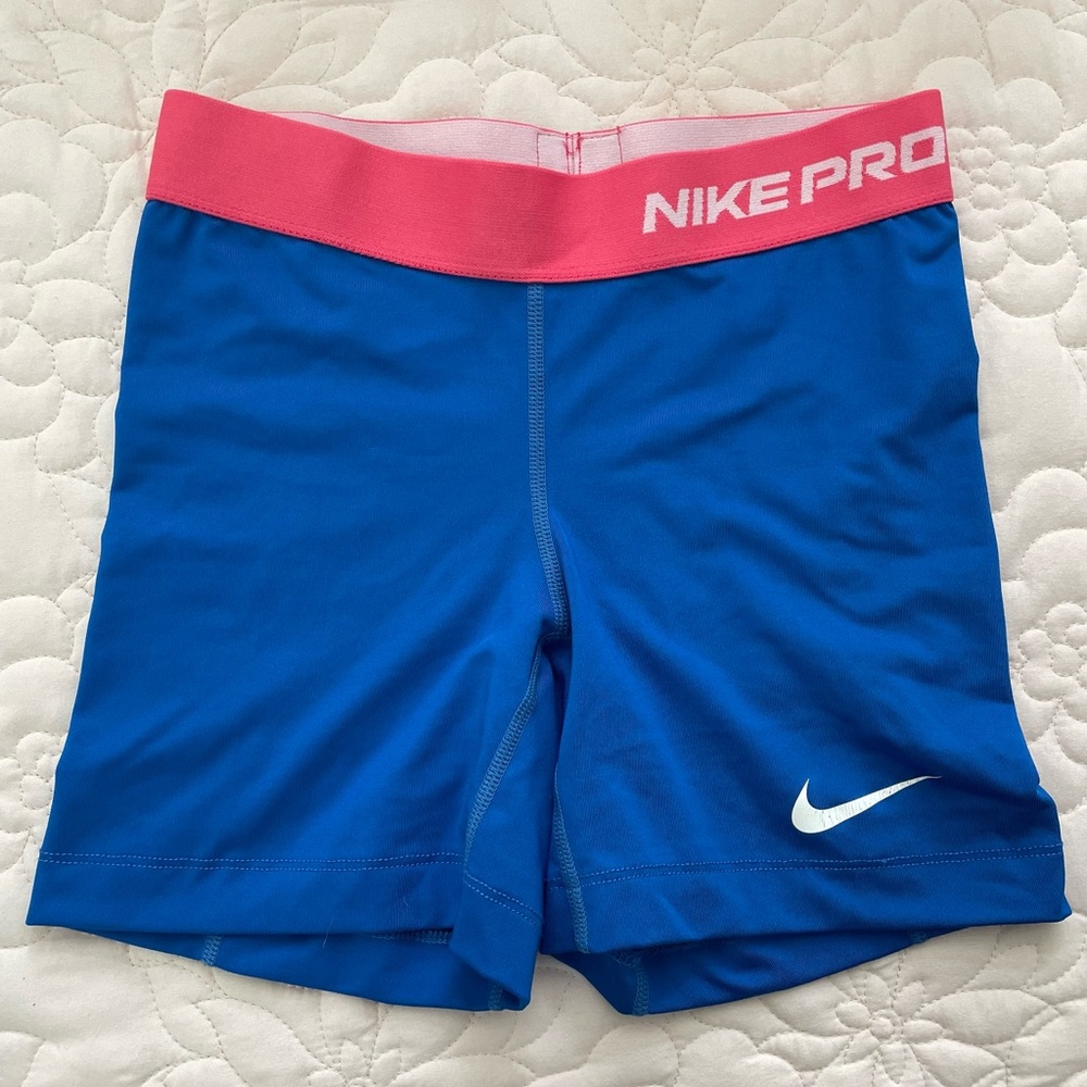 Blue Nike compression shorts